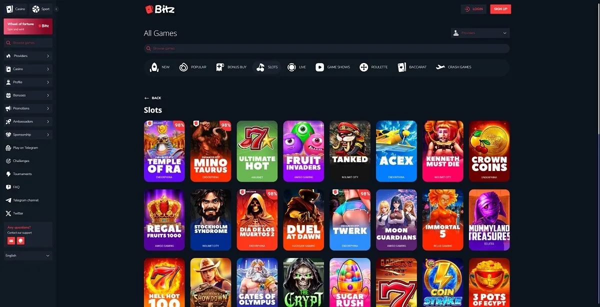 Bitz Casino games lobby screenshot: Bitz 'All Games' slots lobby with category tabs (New Popular Live Crash Games) and slots such as Temple of Ra and Fruit Invaders