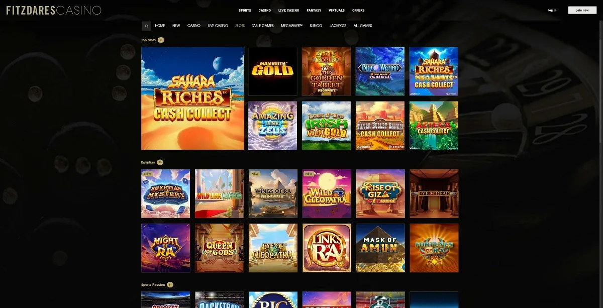 Fitzdares games lobby screenshot: Fitzdares Casino lobby with Top Slots (Sahara Riches Cash Collect Mammoth Gold) and an Egyptian-themed slots row