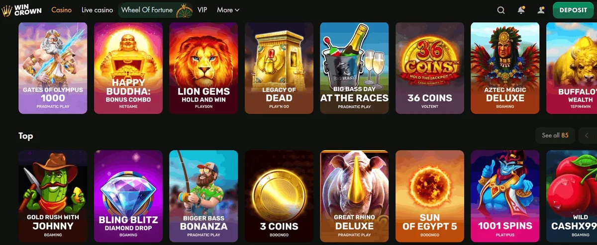 Wincrown games lobby screenshot: Wincrown casino lobby with a Deposit button in the header and a Top row of slots such as Gold Rush with Johnny Bigger Bass Bonanza and Great Rhino Deluxe